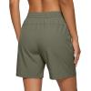 image:imageIWOLLENCE Womens 7 Hiking Shorts Stretch Lightweight Quick Dry Athletic Comfy Summer Long Shorts with 2 Zipper PocketsCarmy Green