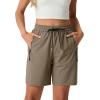 image:imageIWOLLENCE Womens 7 Hiking Shorts Stretch Lightweight Quick Dry Athletic Comfy Summer Long Shorts with 2 Zipper PocketsCdark Khaki