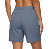 image:imageIWOLLENCE Womens 7 Hiking Shorts Stretch Lightweight Quick Dry Athletic Comfy Summer Long Shorts with 2 Zipper PocketsCnavy Blue