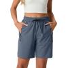 image:imageIWOLLENCE Womens 7 Hiking Shorts Stretch Lightweight Quick Dry Athletic Comfy Summer Long Shorts with 2 Zipper PocketsCnavy Blue